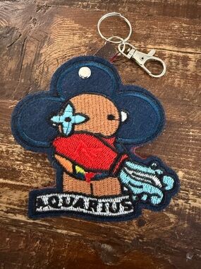 Embroidered Character Keychain with Navy, Red & Light Blue Aquarius